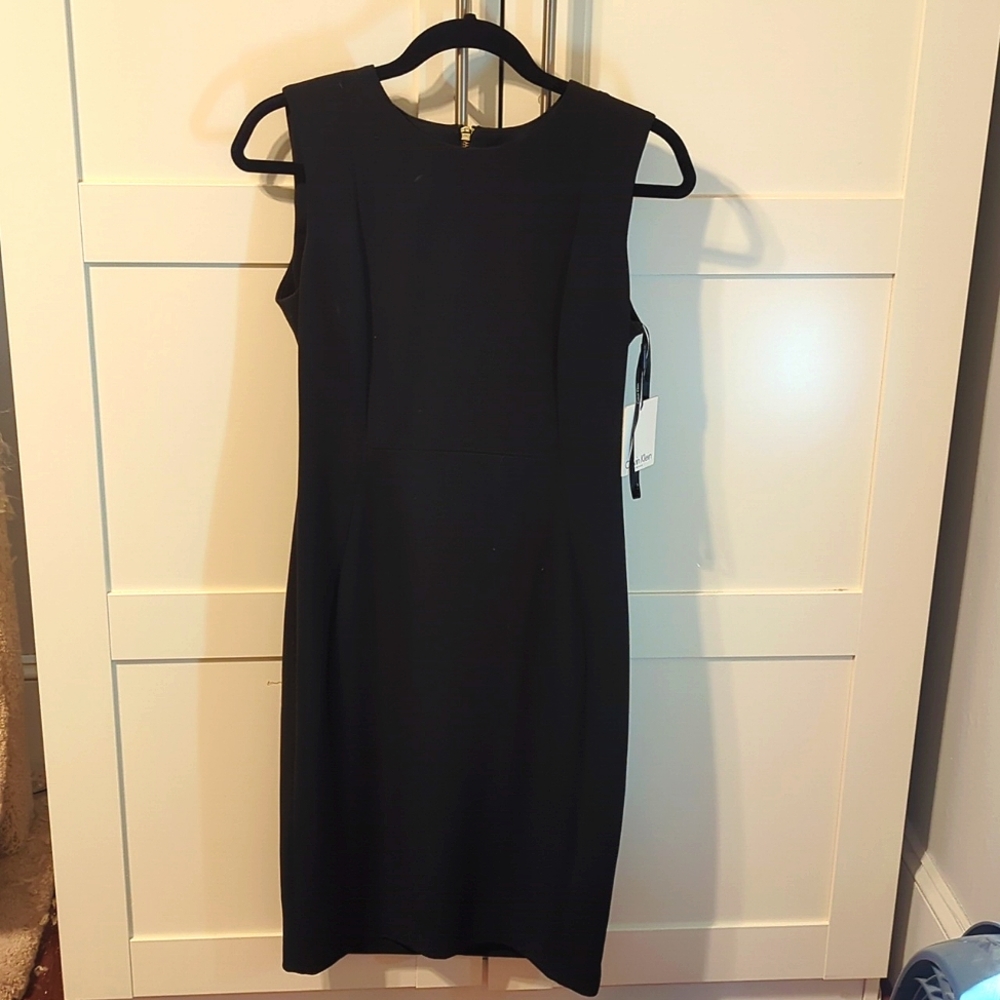 Calvin Klein black dress size 8, over the knee length
